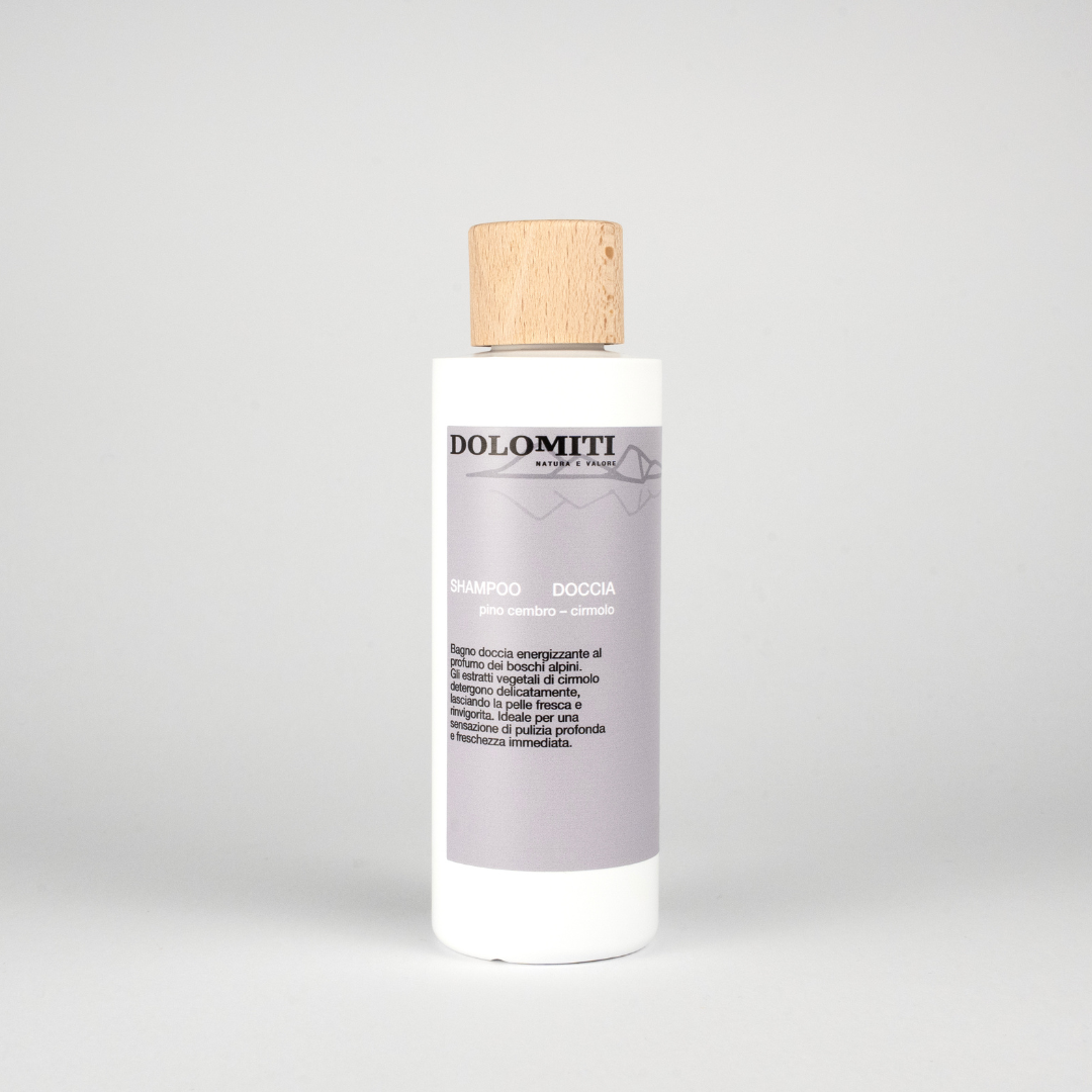 Shampoo doccia al pino cirmolo Dolomiti, flacone da 250 ml con tappo in legno